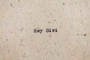 Text on paper: Hey Siri