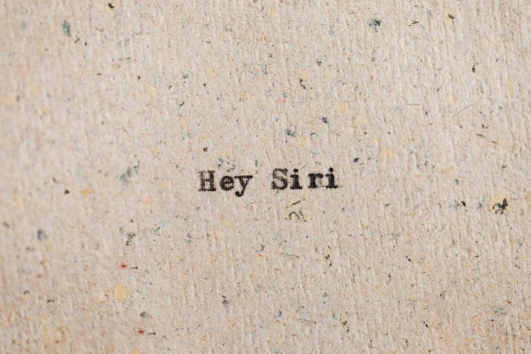 Text on paper: Hey Siri