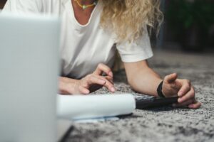 Woman using a calculator