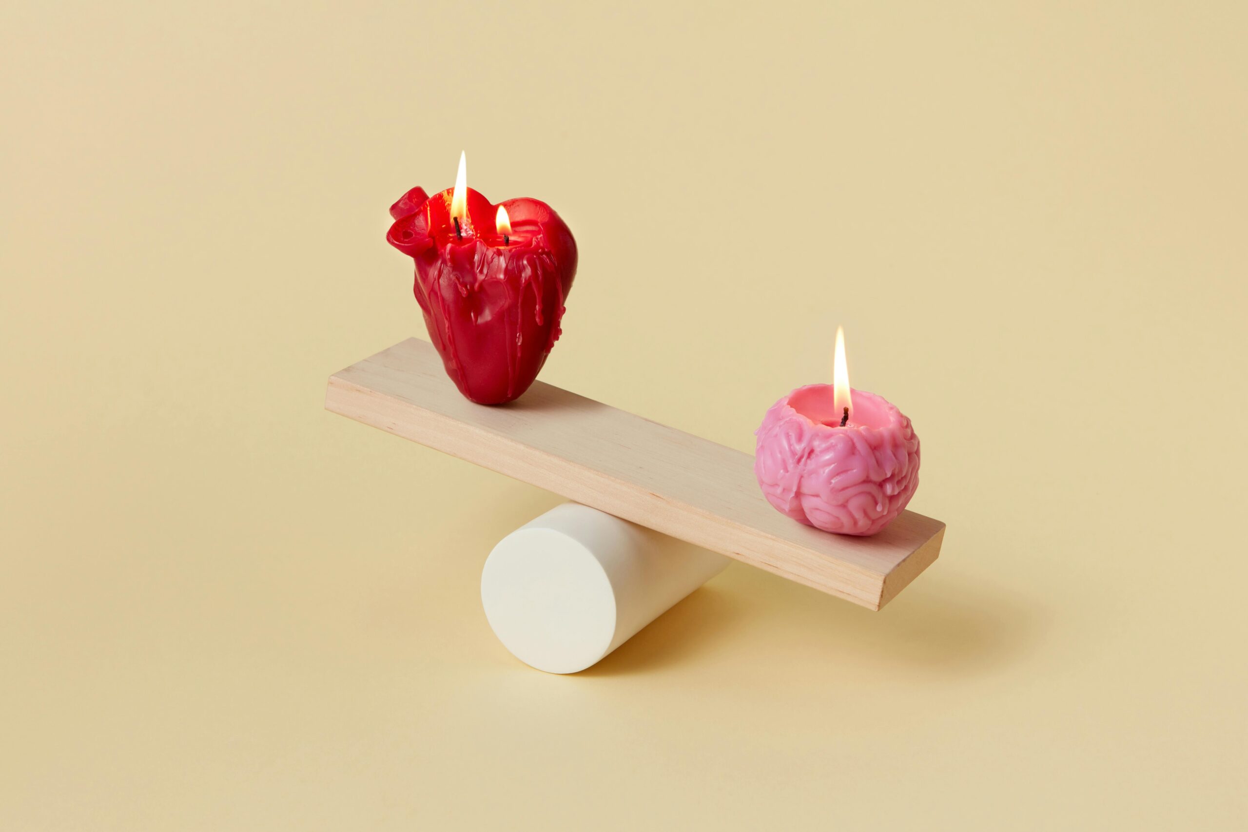 heart and brain candles balancing